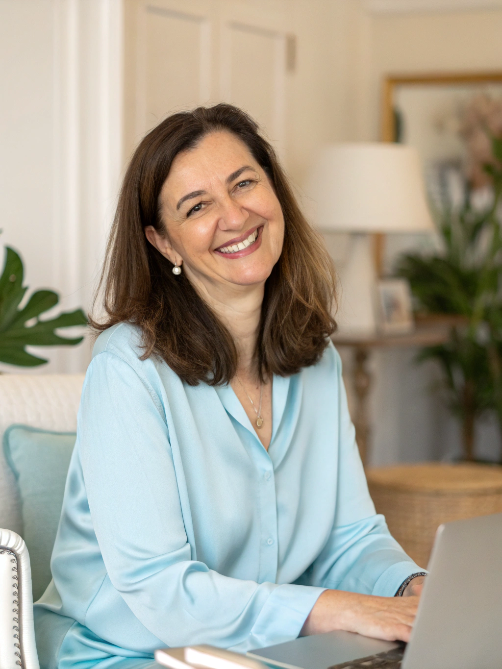 Sarah Mitchell, ROBO Pro Coach smiling in bright learning studio